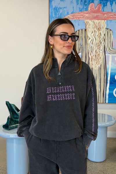Eden Zip Neck Jumper Shadow by Summi Summi – acid wash cotton jumper with zip neck and plaid trim details.
