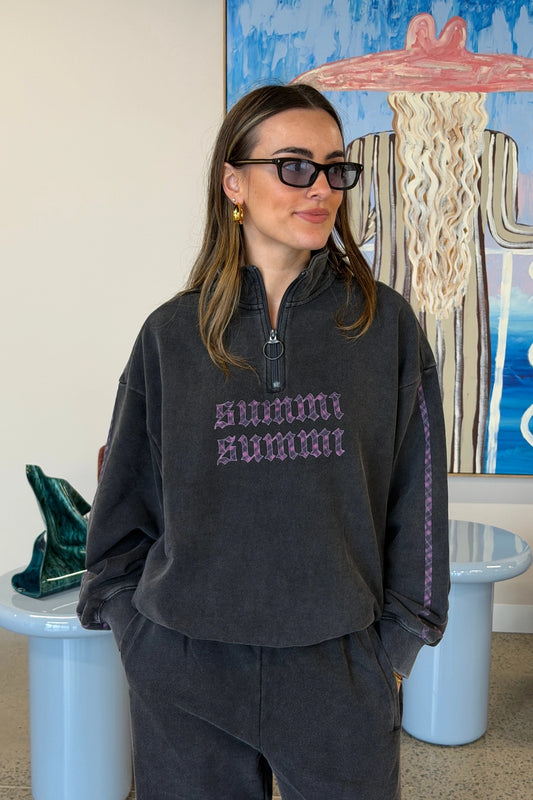 Eden Zip Neck Jumper Shadow by Summi Summi – acid wash cotton jumper with zip neck and plaid trim details.