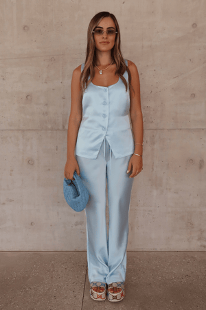 Maja Vest Blue by Sneaky Link – Trendy double-lined satin vest with a chic square neckline and adjustable drawstring back, perfect for polished day or night looks.