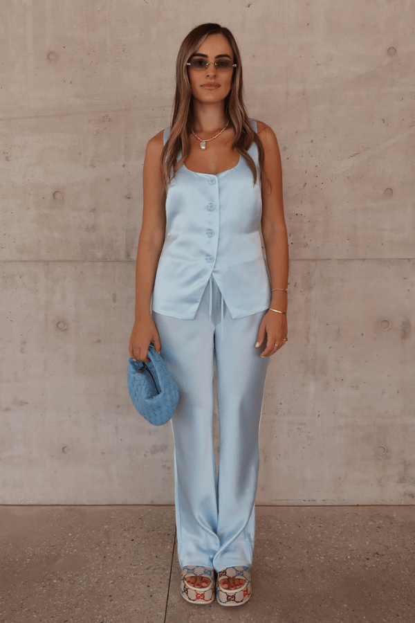 Maja Vest Blue by Sneaky Link – Trendy double-lined satin vest with a chic square neckline and adjustable drawstring back, perfect for polished day or night looks.