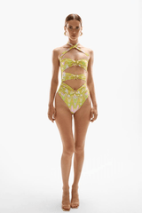 Coupe Seastar Skirt Wavy Gold by Cin Cin Swim, printed mini skirt with star hardware. Perfect for beach parties or statement looks.