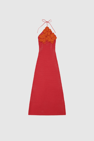 La Monada Knit Maxi Dress Coral by The Wolf Gang – A trendy one-shoulder knit maxi with bold cut-out, thigh-high split, and sculpted fit, perfect for casual or chic occasions.