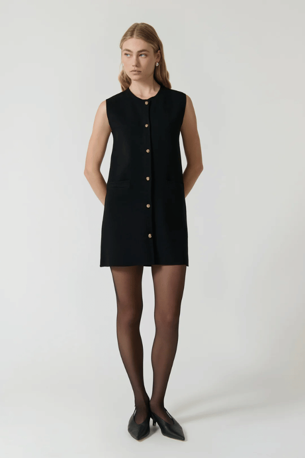 Nanda Dress Black by Onte – A Milano knit mini with gold buttons and A-line fit, designed for sleek, structured wear