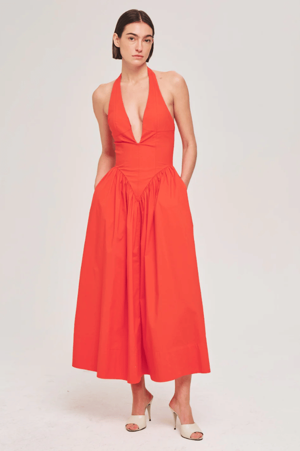 Filippa Dress Fiery Red by Ronny Kobo – A bold, trendy silhouette with a plunging halter neck and voluminous gathered skirt. Perfect for summer soirées and statement events.