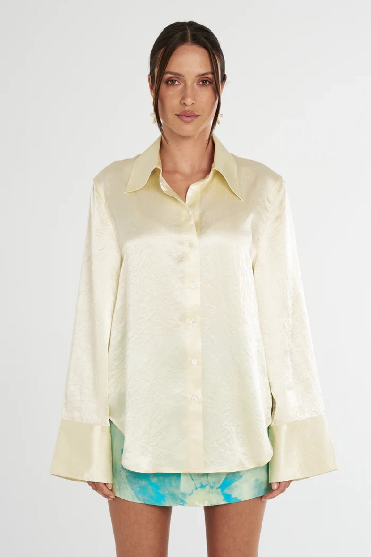 Cuff Shirt Butter by Summi Summi, soft butter-hued shirt with a structured collar and oversized flared cuffs. Lightweight acetate fabric for effortless sophistication.