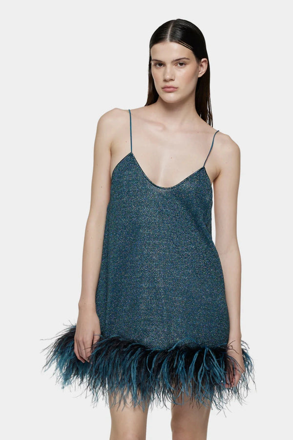 Lumière Plumage Short Dress Peacock by Oséree, a metallic mini with feather trim for a playful, glamorous evening look.
