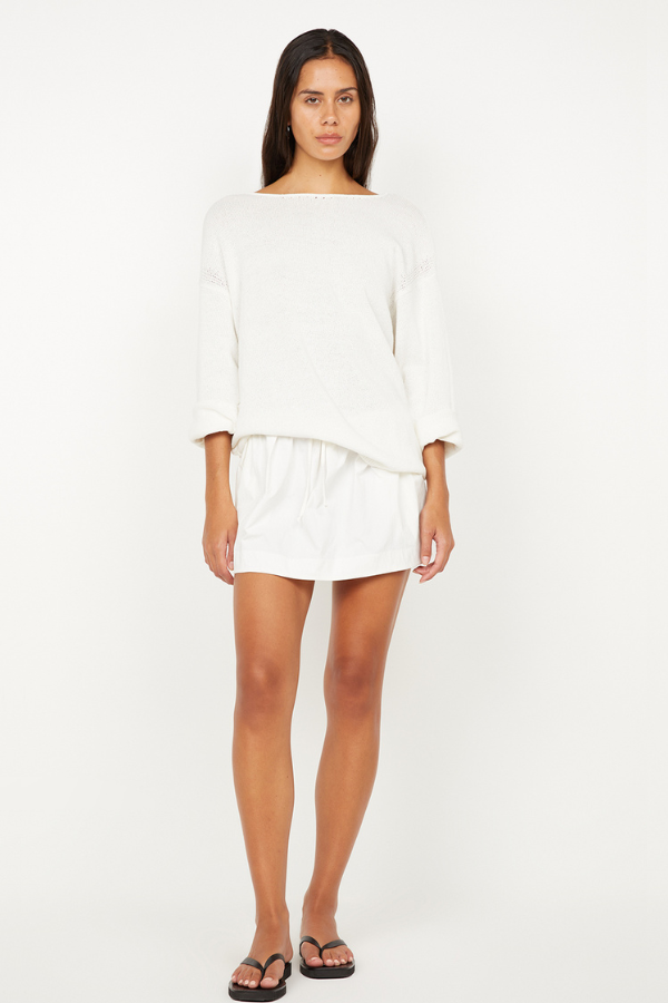 Dante Mini Skirt in Ivory by Bec + Bridge, stretch nylon mini with drawstring waist and gathered finish. Perfect for easy everyday styling.