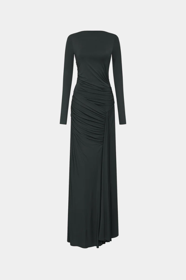 The 'Glacier' Long Sleeve Dress Black by MISHA, full-length black maxi with sculptural draping, high boat neckline, asymmetrical pleats, dry clean only.