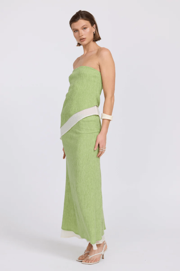 Aperitivo Top Pistachio/Cream by Sovere — strapless, longline, textured lyocell blend with concealed elastic and asymmetric hem. Reversible design. Model: 178cm, size 8.