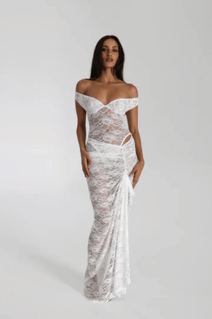 Aubrey Dress White by Natalie Rolt – Elegant lace two-piece with off-shoulder detail and cut-outs, perfect for modern brides or special soirées.