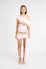 Elara Reversible Dress by Pfeiffer — peach printed mini dress with three-way reversible design and dramatic hem tie detail.