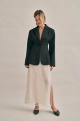 The Saasha Beaded Skirt Ivory by Solaqua – sheer beaded maxi skirt with side split and fluid silhouette.