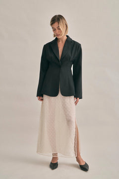 The Saasha Beaded Skirt Ivory by Solaqua – sheer beaded maxi skirt with side split and fluid silhouette.