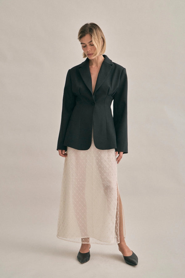 The Saasha Beaded Skirt Ivory by Solaqua – sheer beaded maxi skirt with side split and fluid silhouette.