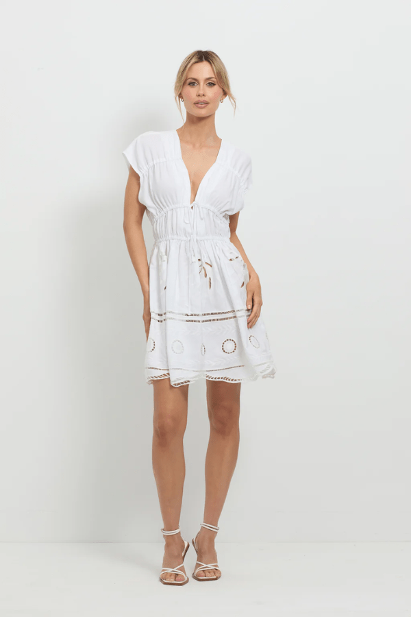 Sunrise Spirit Dress White by Pasduchas – A trendy, embroidered Tencel-linen blend dress with adjustable ties and scalloped hem, perfect for chic day-to-night occasions.