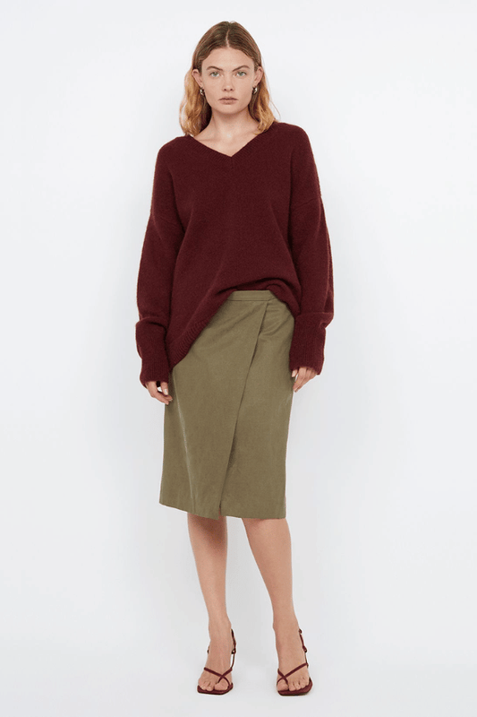 Campbell V Neck Jumper Plum by Bec + Bridge – Soft mohair blend knit with a flattering V neckline, ribbed collar and cuffs. Relaxed fit with dropped shoulders and pull-on style. Cold hand wash.