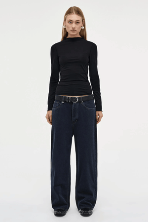 Yoko Baggy Send Off Mid Vintage Indigo by Neuw Denim, trendy oversized baggy jeans with a low-rise waist and ultra-relaxed fit. Perfect for a slouchy, lived-in look with styling versatility, crafted from rigid denim that molds to your shape over time.