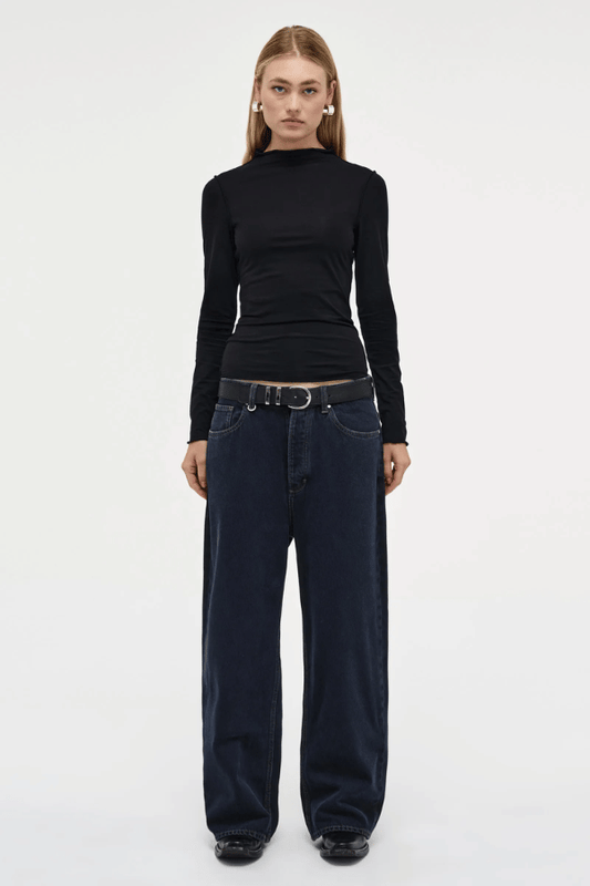 Yoko Baggy Send Off Mid Vintage Indigo by Neuw Denim, trendy oversized baggy jeans with a low-rise waist and ultra-relaxed fit. Perfect for a slouchy, lived-in look with styling versatility, crafted from rigid denim that molds to your shape over time.