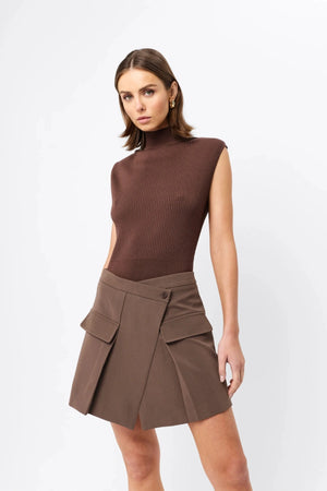 Quiet Force Top by Mossman in sky blue, ribbed sleeveless turtleneck with removable shoulder pads for sleek everyday styling.