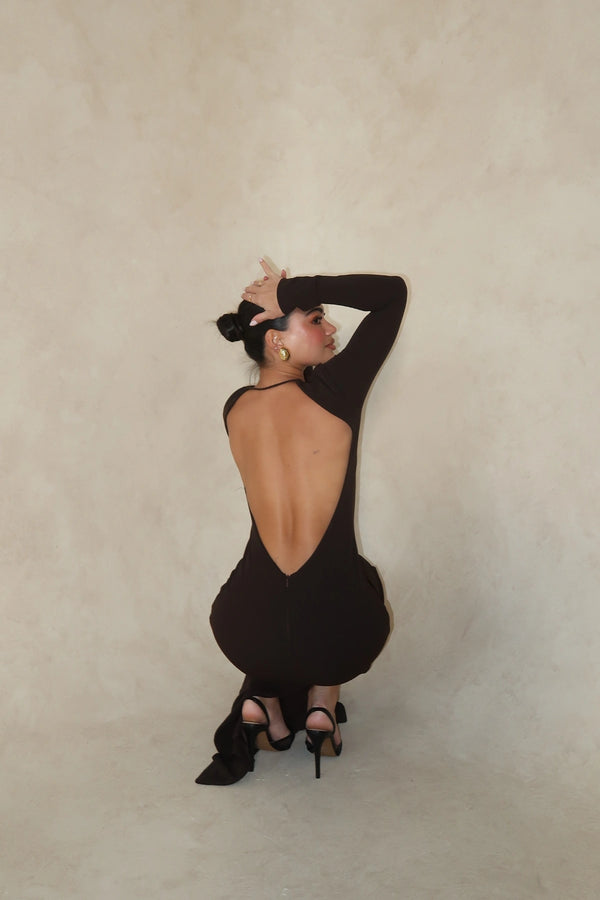 Indie Gown Coffee by Effie Kats – Long-sleeve stretch crepe gown with dramatic open back, designed to flatter with timeless elegance.