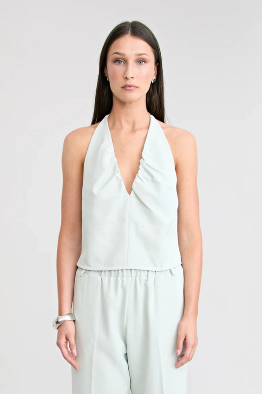 Santo Halter Top by Pfeiffer, halter top with ruching and tailored fit, perfect for pairing with pants or denim for elevated looks