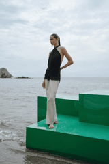 Linus Dress Ying Yang by Baobab – A trendy, versatile maxi with glossy fabric, adjustable halter straps, cut-outs, and a dramatic slit, perfect for bold occasions.