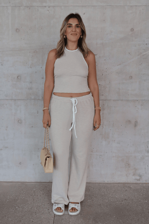 Charlie Halter Top Sand/White by Sneaky Link – A trendy summer essential with a chic halter neckline and open back, perfect for beach-to-bar style.