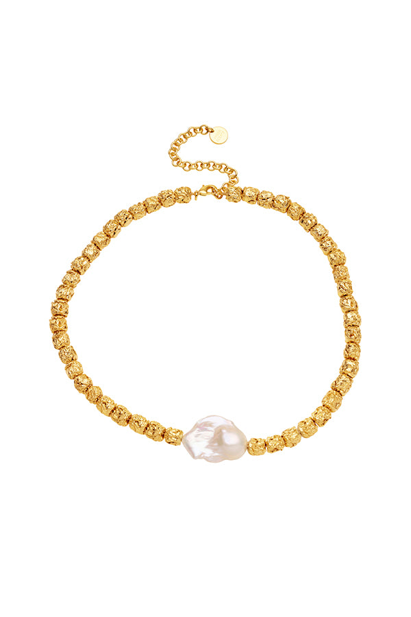 Stevie Necklace by Amber Sceats, a viral statement piece featuring a large baroque freshwater pearl with textured 24k gold pendants, perfect for elegant occasions.