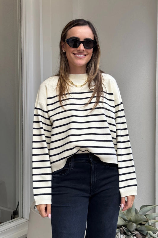 Marta Sweater Navy Breton by Onte – Soft-touch souffle knit sweater with a boxy cropped fit. Features classic navy Breton stripes, ribbed neck, cuffs, and hem. Heavyweight, relaxed A-line silhouette.