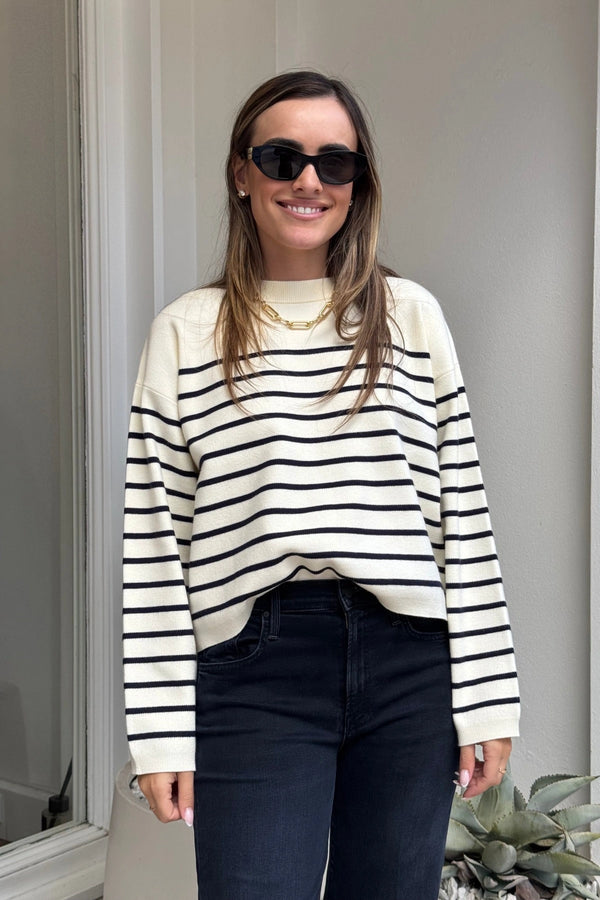 Marta Sweater Navy Breton by Onte – Soft-touch souffle knit sweater with a boxy cropped fit. Features classic navy Breton stripes, ribbed neck, cuffs, and hem. Heavyweight, relaxed A-line silhouette.