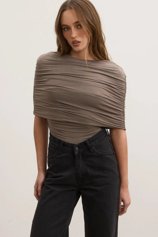 Bayse Daisy Bodysuit in Mink, a sculpted stretch-fit design with high neckline and all-over ruching for a sleek finish.