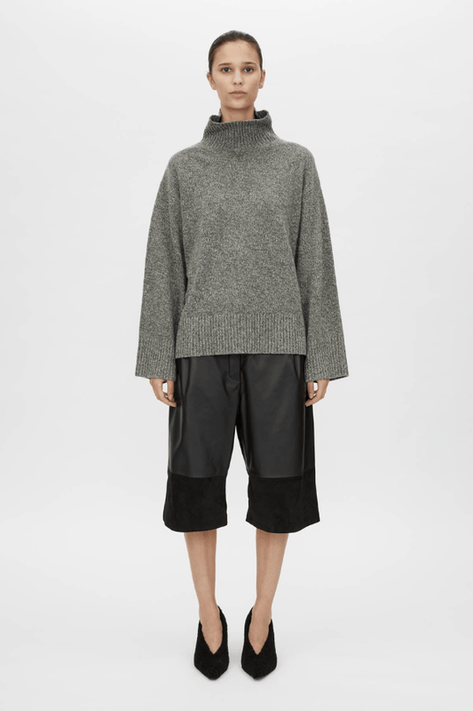 Breccia Knit Sweater Khaki by Camilla and Marc – Trendy oversized merino wool sweater with ribbed details and a modern split back, perfect for casual layering.