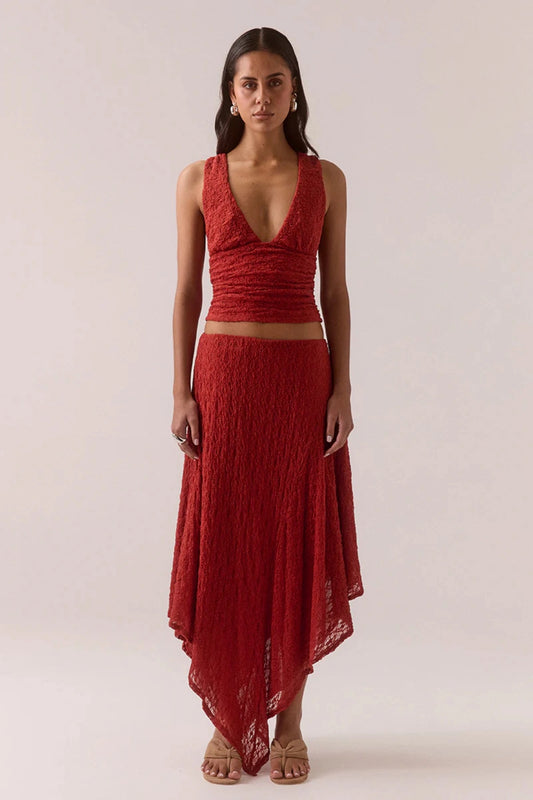 Aaila Lace Top – Blood Orange by Sovere, fitted plunge-neck stretch lace top with side gathers. Perfect for layering or nights out.