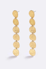 Sunset Hour Earrings Gold by Emma Pills - long gold drop earrings with hammered texture, designed for a bold statement look.
