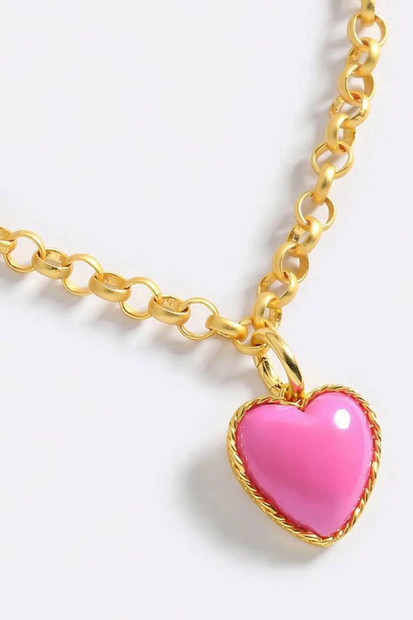 Hot Hearts Necklace by Emma Pills, a candy pink enamel heart pendant on adjustable gold-plated chain for bold, playful styling.