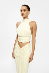 Cassidy Top Lemon by Effie Kats — A fitted, ruched silhouette crafted from soft stretch jersey for comfort and style. Perfect for layering or standalone wear.