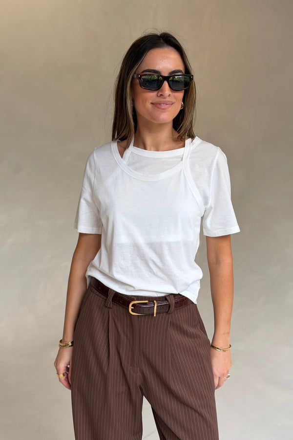 Layered Tee in White by Sneaky Link, 100% cotton with a relaxed fit and layered neckline detail. Perfect for elevated casual dressing.
