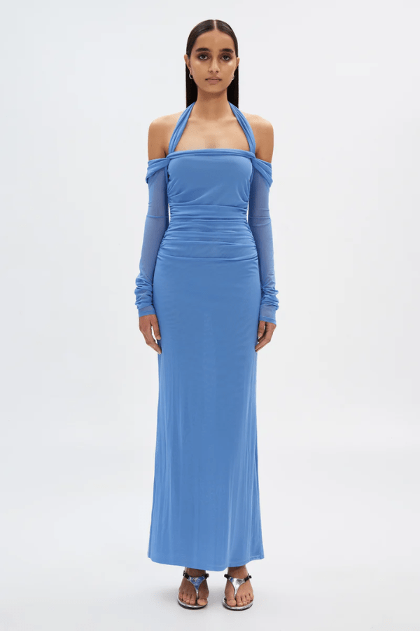 Sonnet Mesh Dress Cornflower Blue by Misha – A trendy off-shoulder, body-skimming maxi with halter neck strap and delicate gathers, perfect for sophisticated nights.