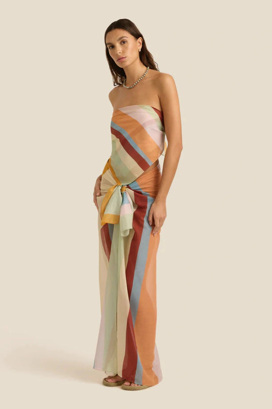 Square Pareo in Iris by Soleil Soleil, a versatile organic cotton wrap or scarf with rainbow-hued stripes, perfect for relaxed resort days.