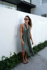 NEW Artemis Dress Khaki by D'Artemide – Cotton halter dress with fringe, low back, front split, and cold hand wash.