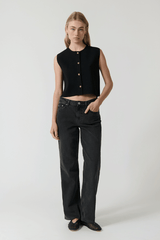 Linda Gilet Black by Onte – Trendy crochet-style knit gilet in breathable cotton with gold buttons and patch pockets, perfect for layering day-to-night.
