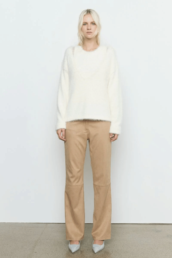 Sabado Combo Knit Cream by Sovere – Trendy two-piece knit set with a fluffy V-neck sweater and ribbed tank, perfect for layering in casual or chic looks.