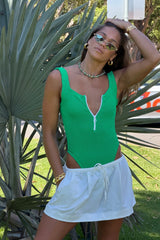 Dallas Swim in Emerald by Hunza G, square-neck crinkle one-piece with front zip and scooped back for a bold retro look.