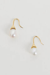 Odette Pearl Earrings by Heaven Mayhem – gold hook earrings with luminous pearl drops, perfect for timeless everyday elegance.