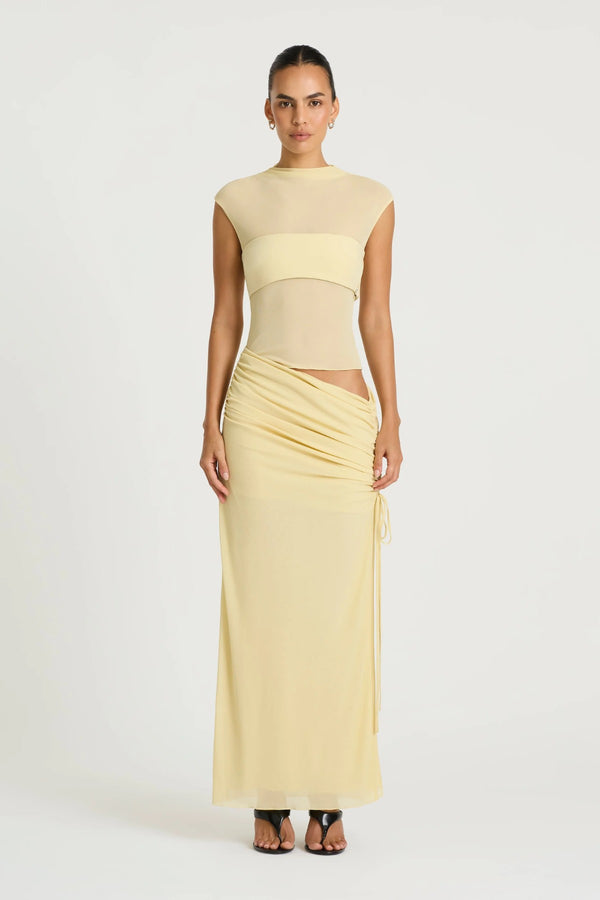 Becker Maxi Dress in Lemon Cream by Benni, a stretch mesh maxi with cap sleeves, contrast bust panel, and adjustable side split.