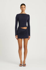 Wilder Dress Navy by Benni - stretch jersey mini dress with waist cut out and draped skirt, designed for a sleek sculpted silhouette.