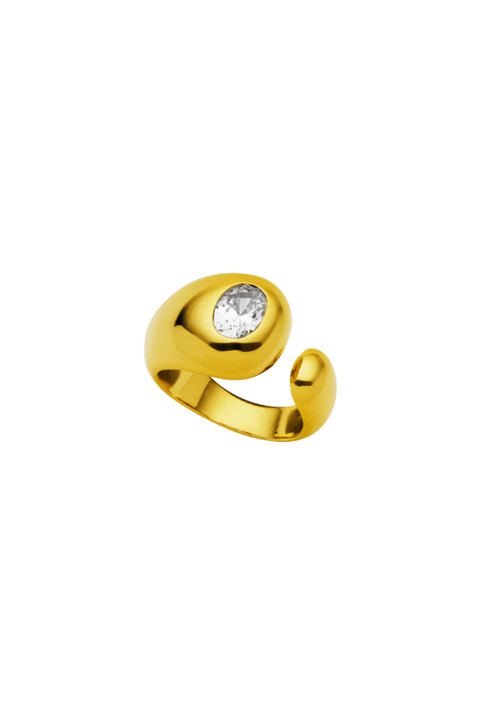Vesper Ring Gold by Amber Sceats, sculptural curved design with sparkling cubic zirconia, handcrafted in Italy for a chic, viral statement piece.