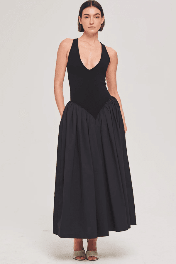 Sirinda Dress Black by Ronny Kobo – A trendy blend of modern romance and architectural elegance featuring a textured lace knit bodice and structured cotton skirt. Perfect for impactful evening events and special occasions.