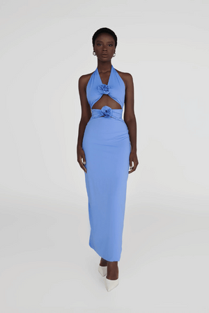 Vaupés Coast Blue by Maygel Coronel – Maxi dress with halter neck, open back, 3D flowers, cutouts, ruched waist, and skirt.