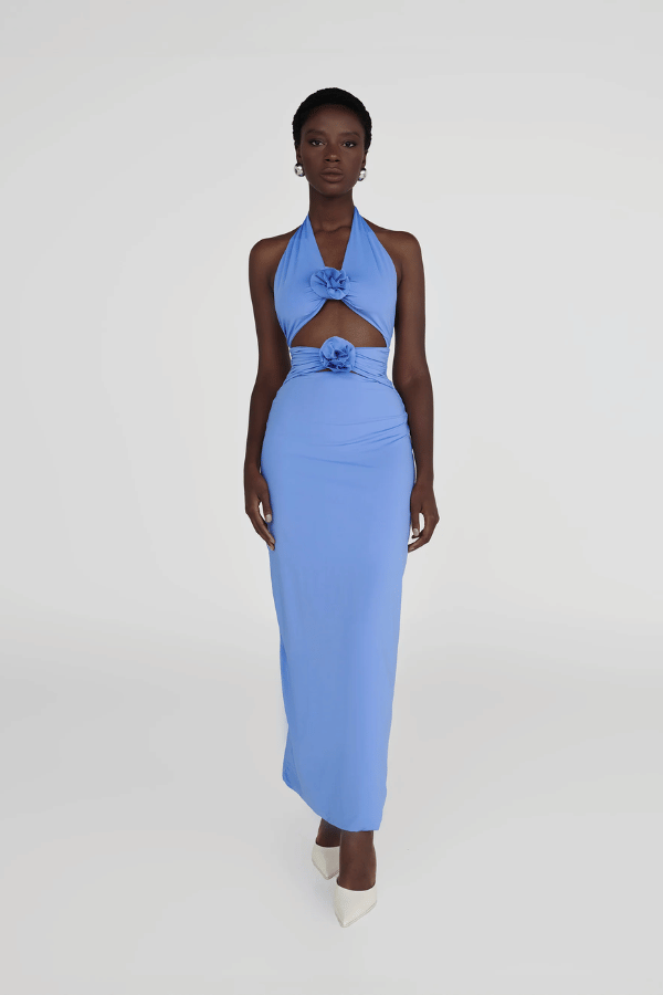 Vaupés Coast Blue by Maygel Coronel – Maxi dress with halter neck, open back, 3D flowers, cutouts, ruched waist, and skirt.